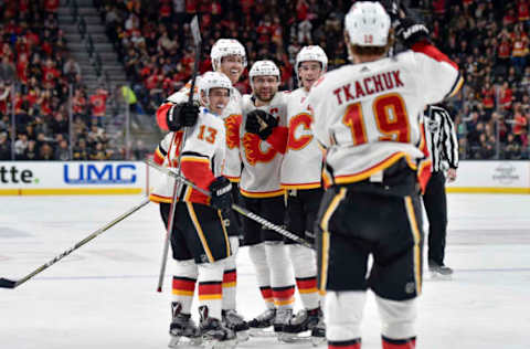 LAS VEGAS, NV – FEBRUARY 21: Dougie Hamilton #27 celebrates a goal scored by Matthew Tkachuk #19 with his teammates Johnny Gaudreau #13, Mark Giordano #5, and Sean Monahan #23 of the Calgary Flames against the Vegas Golden Knights during the game at T-Mobile Arena on February 21, 2018 in Las Vegas, Nevada. (Photo by David Becker/NHLI via Getty Images)