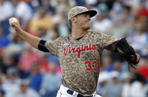 Jun 22, 2015; Omaha, NE, USA; Virginia Cavaliers pitcher Connnor Jones (33) throws during the first inning against the Vanderbilt Commodores in game one of the College World Series Finals at TD Ameritrade Park. Mandatory Credit: Bruce Thorson-USA TODAY Sports