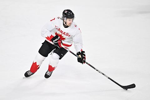 HALIFAX, CANADA – JANUARY 05: Brennan Othmann #7 of Team Canada skates the puck during the third period against Team Czech Republic in the gold medal round of the 2023 IIHF World Junior Championship at Scotiabank Centre on January 5, 2023, in Halifax, Nova Scotia, Canada. Team Canada defeated Team Czech Republic 3-2 in overtime and become the 2023 IIHF World Junior Champions. (Photo by Minas Panagiotakis/Getty Images)