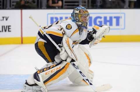 NHL Power Rankings: Nashville Predators goalie Pekka Rinne (35) defends the goal against the Los Angeles Kings during the overtime period at Staples Center. Mandatory Credit: Gary A. Vasquez-USA TODAY Sports