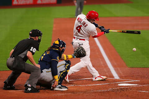 ST LOUIS, MO – SEPTEMBER 24: Yadier Molina #4 of the St. Louis Cardinals hits a single against the Milwaukee Brewers in the second inning at Busch Stadium on September 24, 2020 in St Louis, Missouri. (Photo by Dilip Vishwanat/Getty Images)