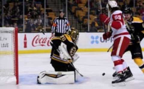 Sep 28, 2016; Boston, MA, USA; Boston Bruins goalie Malcolm Subban (70) makes a save in front of Detroit Red Wings forward Tyler Bertuzzi (59) in the first period during a preseason hockey game at TD Garden. Mandatory Credit: Bob DeChiara-USA TODAY Sports