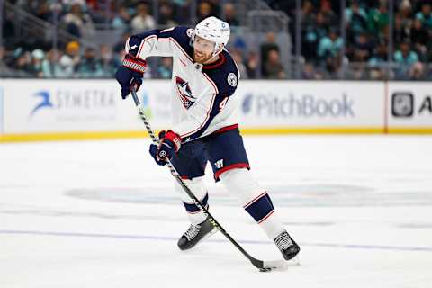 SEATTLE, WASHINGTON – JANUARY 28: Vladislav Gavrikov #4 of the Columbus Blue Jackets shoots during the third period against the Seattle Kraken at Climate Pledge Arena on January 28, 2023 in Seattle, Washington. (Photo by Steph Chambers/Getty Images)