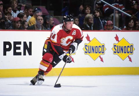 Dec 18, 1998; East Rutherford, NJ, USA; FILE PHOTO; Calgary Flames right wing Theoren Fleury (14) in action against the New Jersey Devils at Continental Airlines Arena. Mandatory Credit: Lou Capozzola-USA TODAY NETWORK