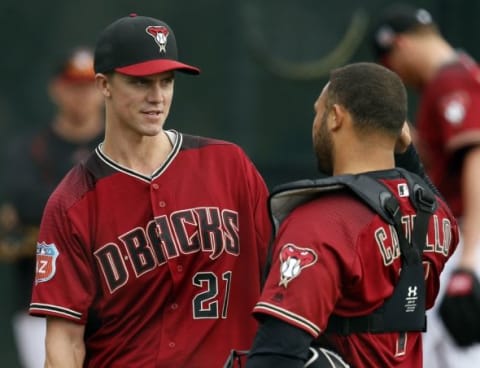 Feb 19, 2016; Scottsdale, AZ, USA; Arizona Diamondbacks pitcher Zack Greinke (21) talks to catcher Welington Castillo (7) in the bullpen during spring training camp at Salt River Fields. Mandatory Credit: Rick Scuteri-USA TODAY Sports