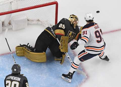 LAS VEGAS, NEVADA – FEBRUARY 26: Marc-Andre Fleury #29 of the Vegas Golden Knights defends the net against Gaetan Haas #91 of the Edmonton Oilers in the second period of their game at T-Mobile Arena on February 26, 2020 in Las Vegas, Nevada. The Golden Knights defeated the Oilers 3-0. (Photo by Ethan Miller/Getty Images)