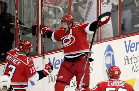 Carolina Hurricanes’ Eric Staal (12) celebrates his second goal of the game with teammates Ray Whitney (13) and Chad LaRose (59) against the New Jersey Devils during second period action in Game 6 of the Eastern Conference quarterfinals at the RBC Center in Raleigh, North Carolina, on Sunday April 26, 2009. (Photo by Chris Seward/Raleigh News & Observer/MCT via Getty Images)