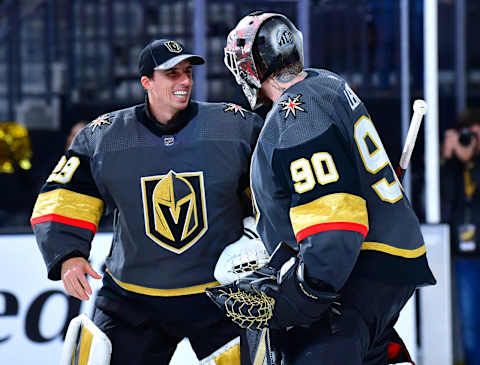 Vegas Golden Knights goaltender Robin Lehner (90) is congratulated by goaltender Marc-Andre Fleury (29) after shutting out the New Jersey Devils. Mandatory Credit: Stephen R. Sylvanie-USA TODAY Sports