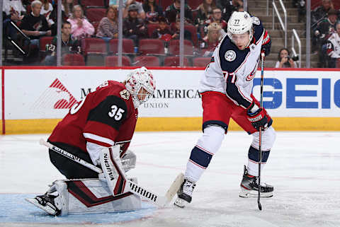 GLENDALE, ARIZONA – NOVEMBER 07: Goaltender Darcy Kuemper #35 of the Arizona Coyotes makes a pad save as Josh Anderson #77 of the Columbus Blue Jackets attempts a deflection during the second period of the NHL game at Gila River Arena on November 07, 2019 in Glendale, Arizona. (Photo by Christian Petersen/Getty Images)