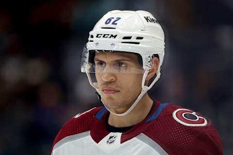 SEATTLE, WASHINGTON – NOVEMBER 13: Caleb Jones #82 of the Colorado Avalanche looks on during the first period against the Seattle Kraken at Climate Pledge Arena on November 13, 2023 in Seattle, Washington. (Photo by Steph Chambers/Getty Images)