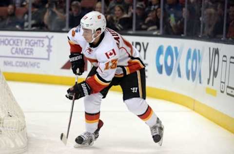 November 6, 2016; Anaheim, CA, USA; Calgary Flames left wing Johnny Gaudreau (13) controls the puck against the Anaheim Ducks during the first period at Honda Center. Mandatory Credit: Gary A. Vasquez-USA TODAY Sports