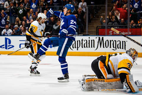 TORONTO, ON – MARCH 10: Kasperi Kapanen #24 of the Toronto Maple Leafs celebrates after scoring on Tristan Jarry #35 of the Pittsburgh Penguins during the first period at the Air Canada Centre on March 10, 2018 in Toronto, Ontario, Canada. Phil Kessel #81 of the Pittsburgh Penguins skates behind Kapanen. (Photo by Mark Blinch/NHLI via Getty Images)