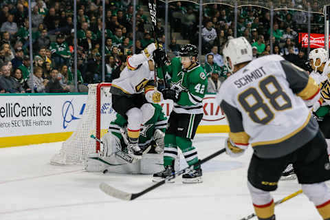 DALLAS, TX – MARCH 15: Vegas Golden Knights center Ryan Carpenter (40) jumps out of the way as the puck is blocked by Dallas Stars goaltender Anton Khudobin (35) and Dallas Stars defenseman Taylor Fedun (42) during the game between the Dallas Stars and the Vegas Golden Knights on March 15, at the American Airlines Center in Dallas, Texas. (Photo by Matthew Pearce/Icon Sportswire via Getty Images)