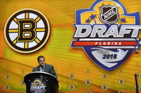 Jun 26, 2015; Sunrise, FL, USA; Boston Bruins general manager Don Sweeney makes the first of three consecutive draft picks in the first round of the 2015 NHL Draft at BB&T Center. Mandatory Credit: Steve Mitchell-USA TODAY Sports