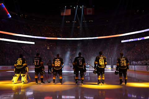 LAS VEGAS, NV – MARCH 29: Vegas Golden Knights and Minnesota Wild players stand at attention for the national anthem prior to their game at T-Mobile Arena on March 29, 2019 in Las Vegas, Nevada. (Photo by Jeff Bottari/NHLI via Getty Images)