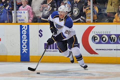 NASHVILLE, TN – MARCH 15: Ian Cole #28 of the St. Louis Blues skates during warm ups prior to a game against the Nashville Predators at Bridgestone Arena on March 15, 2014 in Nashville, Tennessee. (Photo by Frederick Breedon/Getty Images)