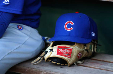 WASHINGTON, DC – JUNE 26: A hat and glove sit on the bench in the Chicago Cubs dugout during the Cubs game against the Washington Nationals at Nationals Park on June 26, 2017 in Washington, DC. (Photo by Rob Carr/Getty Images)