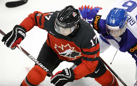 VICTORIA , BC – DECEMBER 21: Nick Suzuki #17 of Team Canada takes a face off versus Oliver Giertl #16 of Team Slovakia at the IIHF World Junior Championships at the Save-on-Foods Memorial Centre on December 21, 2018 in Victoria, British Columbia, Canada. (Photo by Kevin Light/Getty Images)