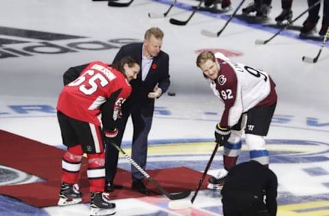 Ceremonial face-off with Erik Karlsson of Ottawa Senators, Gabriel Landeskog of Colorado Avalanche, and Daniel Alfredsson during the 2017 SAP NHL Global Series match between Colorado Avalanche and Ottawa Senators at Ericsson Globe in Stockholm, Sweden. (Photo by Nils Petter Nilsson/Ombrello/Getty Images)