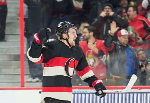 Feb 11, 2016; Ottawa, Ontario, CAN; Ottawa Senators right wing Mark Stone (61) celebrates his goal scored against the Colorado Avalanche in the second period at the Canadian Tire Centre. Mandatory Credit: Marc DesRosiers-USA TODAY Sports