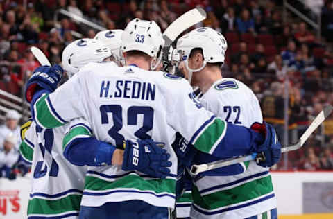 Daniel Sedin #22, Henrik Sedin #33, Vancouver Canucks (Photo by Christian Petersen/Getty Images)