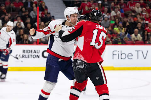 OTTAWA, ON – DECEMBER 29: Washington Capitals Defenceman Tyler Lewington (78) and Ottawa Senators Center Zack Smith (15) fight during second period National Hockey League action between the Washington Capitals and Ottawa Senators on December 29, 2018, at Canadian Tire Centre in Ottawa, ON, Canada. (Photo by Richard A. Whittaker/Icon Sportswire via Getty Images)