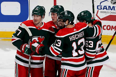 Nico Hischier #13,Jesper Bratt #63 and Jack Hughes #86 of New Jersey Devils (Photo by Elsa/Getty Images)