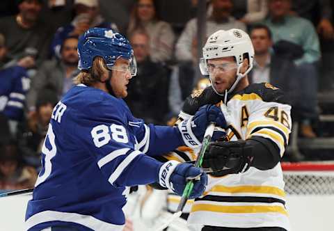 William Nylander #88 of the Toronto Maple Leafs exchanges words with David Krejci #46 of the Boston Bruins (Photo by Bruce Bennett/Getty Images)