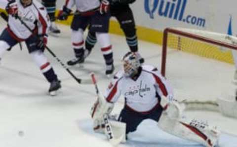 Mar 9, 2017; San Jose, CA, USA; Washington Capitals goalie Braden Holtby (70) makes a save against the San Jose Sharks during the first period at SAP Center at San Jose. Mandatory Credit: Neville E. Guard-USA TODAY Sports