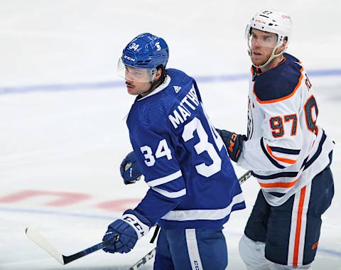 TORONTO, ON – MARCH 29: Connor McDavid #97 of the Edmonton Oilers skates against Auston Matthews #34 of the Toronto Maple Leafs  . (Photo by Claus Andersen/Getty Images)