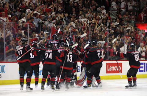 RALEIGH, NORTH CAROLINA – MAY 18: Ian Cole #28 of the Carolina Hurricanes scores at 3:12 of overtime against Igor Shesterkin #31 of the New York Rangers in Game One of the Second Round of the 2022 Stanley Cup Playoffs at PNC Arena on May 18, 2022, in Raleigh, North Carolina. The Hurricanes defeated the Rangers 2-1 in overtime. (Photo by Bruce Bennett/Getty Images)