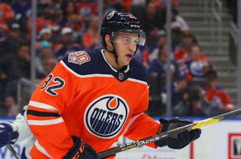 EDMONTON, AB – DECEMBER 22: Edmonton Oilers Defenceman Caleb Jones (82) watches the play up ice in the third period during the Edmonton Oilers game versus the Tampa Bay Lighting on December 22, 2018 at Rogers Place in Edmonton, AB. (Photo by Curtis Comeau/Icon Sportswire via Getty Images)