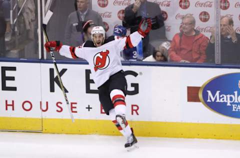 TORONTO, ON:  New Jersey Devils left wing Brian Gibbons (39) celebrates after scoring a shorthanded goal as the Toronto Maple Leafs play the New Jersey Devils on October 11, 2017. (Steve Russell/Toronto Star via Getty Images)