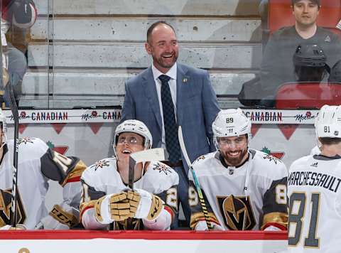 OTTAWA, ON – JANUARY 16: Head coach Peter DeBoer of the Vegas Golden Knights shares a laugh with Cody Eakin #21 and Alex Tuch #89 at the bench before an NHL game against the Ottawa Senators at Canadian Tire Centre on January 16, 2020 in Ottawa, Ontario, Canada. (Photo by Andre Ringuette/NHLI via Getty Images)