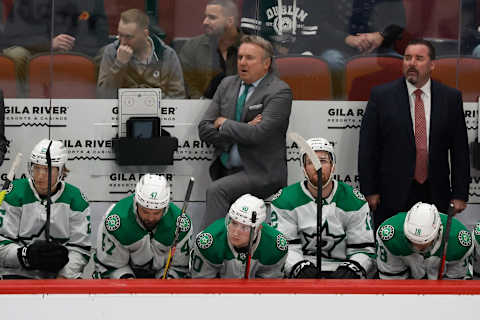 GLENDALE, ARIZONA – FEBRUARY 20: Head coach Rick Bowness of the Dallas Stars looks on from the bench during the third period of the NHL game against the Arizona Coyotes at Gila River Arena on February 20, 2022 in Glendale, Arizona. The Coyotes defeated the Stars 3-1. (Photo by Christian Petersen/Getty Images)