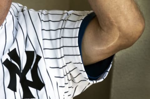 LA QUINTA, CA – APRIL 28: Tommy John, the 4 time All Star Major League Baseball pitcher who won 288 games, shows the famous scar on his elbow in La Quinta, CA on April 28, 2018. John and his son Tommy John III, a chiropractor with a sports medicine background, are trying to put an end to kids getting Tommy John surgery, the elbow operation that saved John’s pitching career and now bears his name. In 1974, when he was 31, John had already pitched 12 years in the major leagues when Dr. Frank Jobe performed the landmark ulnar collateral ligament elbow surgery. He went on to pitch 14 more years and never missed a start. His message now is simple: Dont cut on kids. Kids, the Johns say, are being pressured into overperforming, causing degenerative joint problems. They are overstimulated, less aware, overcoached, and underdeveloped. (Photo by Stan Grossfeld/The Boston Globe via Getty Images)