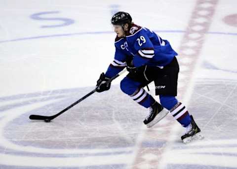 Dec 11, 2014; Denver, CO, USA; Colorado Avalanche center Nathan MacKinnon (29) during a breakaway with the puck in the first period of the game against the Winnipeg Jets at Pepsi Center. Mandatory Credit: Ron Chenoy-USA TODAY Sports