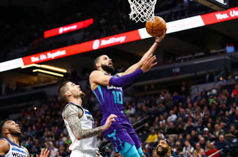 MINNEAPOLIS, MN – FEBRUARY 12: Caleb Martin #10 of the Charlotte Hornets goes up for a shot against Juan Hernangomez #41 of the Minnesota Timberwolves in the first quarter of the game at Target Center on February 12, 2020 in Minneapolis, Minnesota. The Hornets defeated the Timberwolves 115-108. NOTE TO USER: User expressly acknowledges and agrees that, by downloading and or using this Photograph, user is consenting to the terms and conditions of the Getty Images License Agreement. (Photo by David Berding/Getty Images)