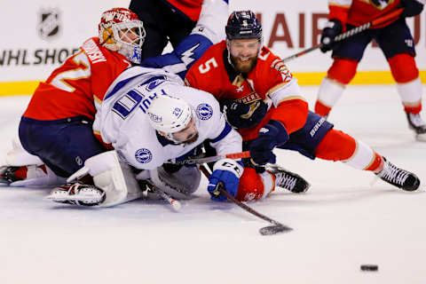 May 19, 2022; Sunrise, Florida, USA; Florida Panthers goaltender Sergei Bobrovsky (72) defenseman Aaron Ekblad (5) and Tampa Bay Lightning left wing Nicholas Paul (20) collide in front of the goal during the third period in game two of the second round of the 2022 Stanley Cup Playoffs at FLA Live Arena. Mandatory Credit: Sam Navarro-USA TODAY Sports