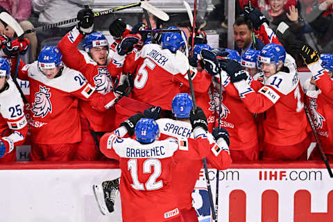 HALIFAX, CANADA – JANUARY 04: David Jiricek #5 of Team Czech Republic celebrates his game tying goal late in the third period with teammates on the bench against Team Sweden in the semifinal round of the 2023 IIHF World Junior Championship at Scotiabank Centre on January 4, 2023 in Halifax, Nova Scotia, Canada. (Photo by Minas Panagiotakis/Getty Images)