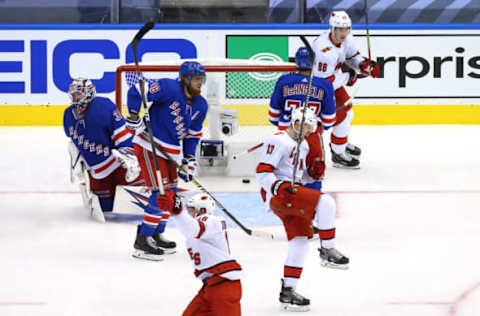 TORONTO, ONTARIO – AUGUST 04: Warren Foegele #13 of the Carolina Hurricanes celebrates after scoring a goal on Igor Shesterkin #31 of the New York Rangers during the third period in Game Three of the Eastern Conference Qualification Round prior to the 2020 NHL Stanley Cup Playoffs at Scotiabank Arena on August 04, 2020, in Toronto, Ontario, Canada. (Photo by Andre Ringuette/Freestyle Photo/Getty Images)