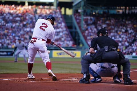 Aug 14, 2022; Boston, Massachusetts, USA; Boston Red Sox shortstop Xander Bogaerts (2) drives in a run on a ground ball fielderÕs choice against the New York Yankees during the first inning at Fenway Park. Mandatory Credit: Gregory Fisher-USA TODAY Sports