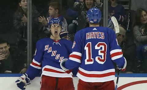 NEW YORK, NEW YORK – DECEMBER 16: Chris Kreider #20 of the New York Rangers celebrates his third period goal against the Vegas Golden Knights and is joined by Kevin Hayes #13 at Madison Square Garden on December 16, 2018 in New York City. The Golden Knights defeated the Rangers 4-3 in overtime. (Photo by Bruce Bennett/Getty Images)