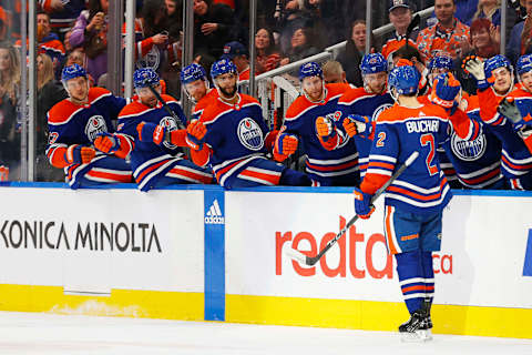 Dec 8, 2023; Edmonton, Alberta, CAN; The Edmonton Oilers celebrate a goal scored by defensemen Evan Bouchard (2) during the first period against the Minnesota Wild at Rogers Place. Mandatory Credit: Perry Nelson-USA TODAY Sports