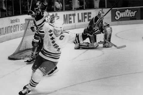 UNITED STATES – FEBRUARY 19: New York Rangers’ Kelly Kisio celebrates after teammate scores to win game against the New Jersey Devils in overtime. (Photo by Gene Kappock/NY Daily News Archive via Getty Images)