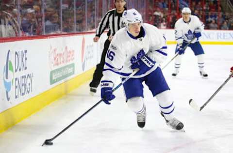 Mar 11, 2017; Raleigh, NC, USA; Toronto Maple Leafs forward Mitch Marner (16) skates with the puck against the Carolina Hurricanes at PNC Arena. The Toronto Maple Leafs defeated the Carolina Hurricanes 3-2 in overtime. Mandatory Credit: James Guillory-USA TODAY Sports