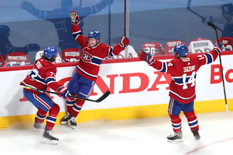 Jun 18, 2021; Montreal, Quebec, CAN; Montreal Canadiens Cole Caufield Tyler Toffoli and Nick Suzuki Mandatory Credit: Jean-Yves Ahern-USA TODAY Sports