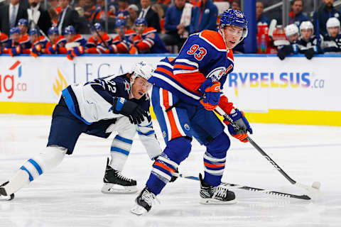 Sep 24, 2023; Edmonton, Alberta, CAN; Edmonton Oilers forward Ryan Nugent-Hopkins (93) looks for a pass in front of Winnipeg Jets forward Mason Appleton(22) during the third period at Rogers Place. Mandatory Credit: Perry Nelson-USA TODAY Sports