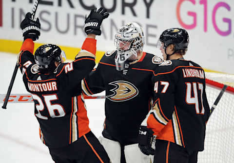 ANAHEIM, CA – MARCH 06: Anaheim Ducks goalie John Gibson (36) is greeted by defenseman Brandon Montour (26) and defenseman Hampus Lindholm (47) after the Ducks defeated the Washington Capitals 4 to 0 in a game played on March 6, 2018, at the Honda Center in Anaheim, CA. (Photo by John Cordes/Icon Sportswire via Getty Images)