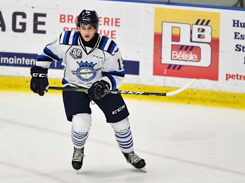 Theo Rochette #19 of the Chicoutimi Sagueneens skates against the Blainville-Boisbriand Armada. (Photo by Minas Panagiotakis/Getty Images)